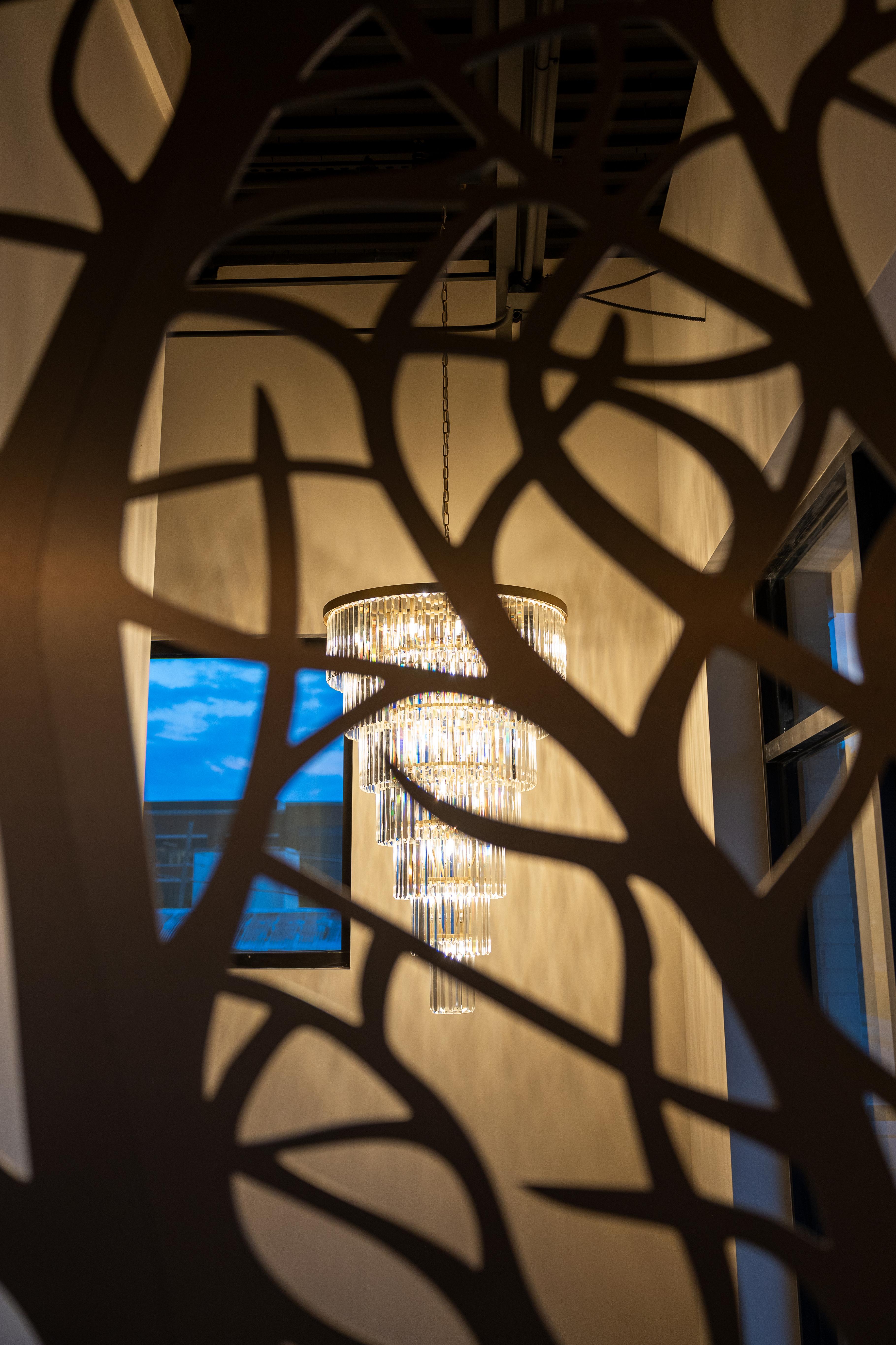 Chandelier and elegant entry at The Chestnut Hall, a holiday party and gala venue in McKinney